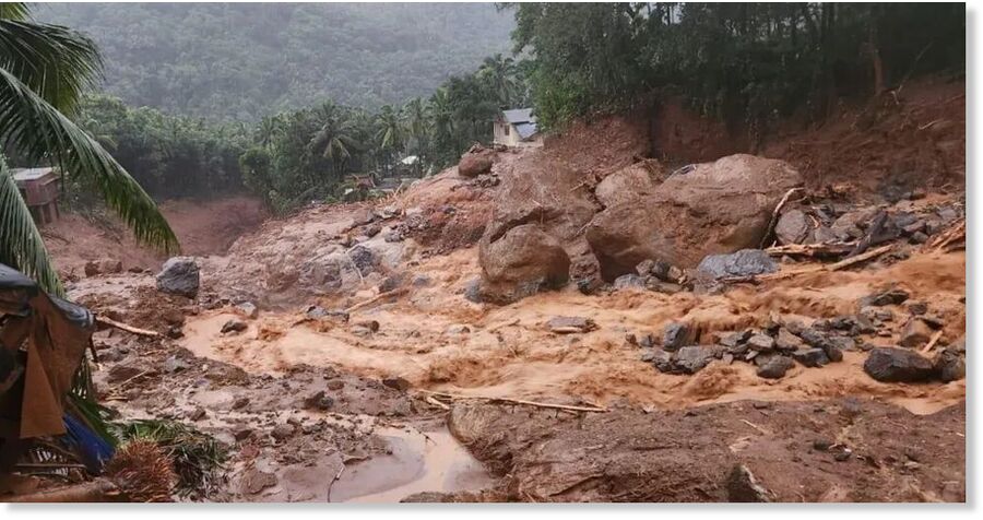 Videos show muddy water gushing through streets and forested areas