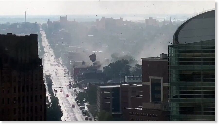 Click to enlarge a waterspout sweeping through downtown Buffalo, New York, on Monday, August 5, damaging buildings, flipping vehicles, and downing trees and power lines.