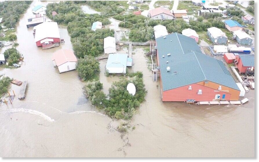 A drone image shows floodwaters threatening the William Miller Memorial School in Napakiak on Sunday, Aug, 18, 2024.