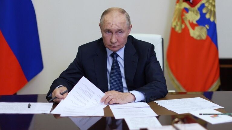Russian President Vladimir Putin chairs a meeting with members of the government via videoconference at the Novo-Ogaryovo state residence, outside Moscow, Russia.