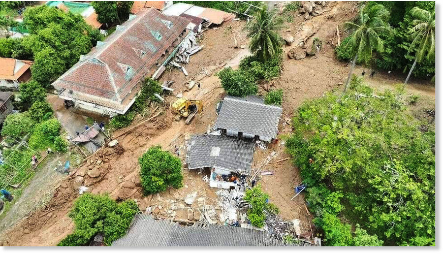 A landslide from a mountain have destroyed buildings in Soi Patak 2, behind Kitti Sangkharam Temple