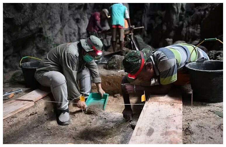 Click to enlarge Archaeologists