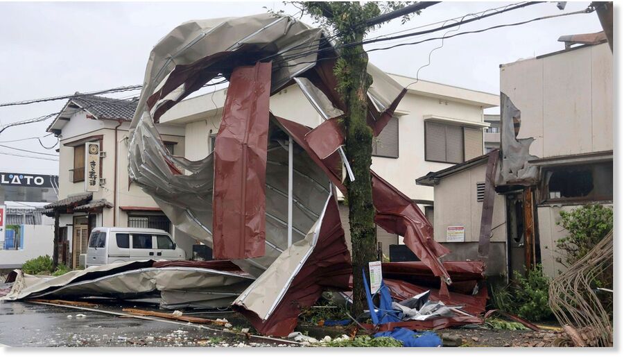 An object blown by strong winds caused by Typhoon Shanshan is stranded on a power line in Miyazaki, southwestern Japan, August 29, 2024.