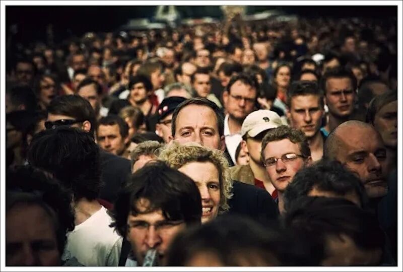 Click to enlarge crowd face psychopath