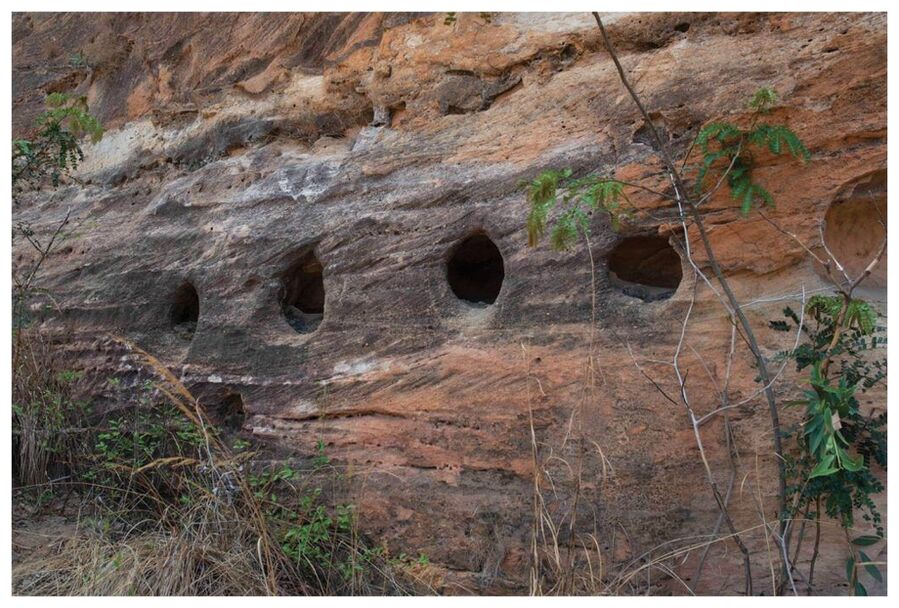 four circular rock-cut niches
