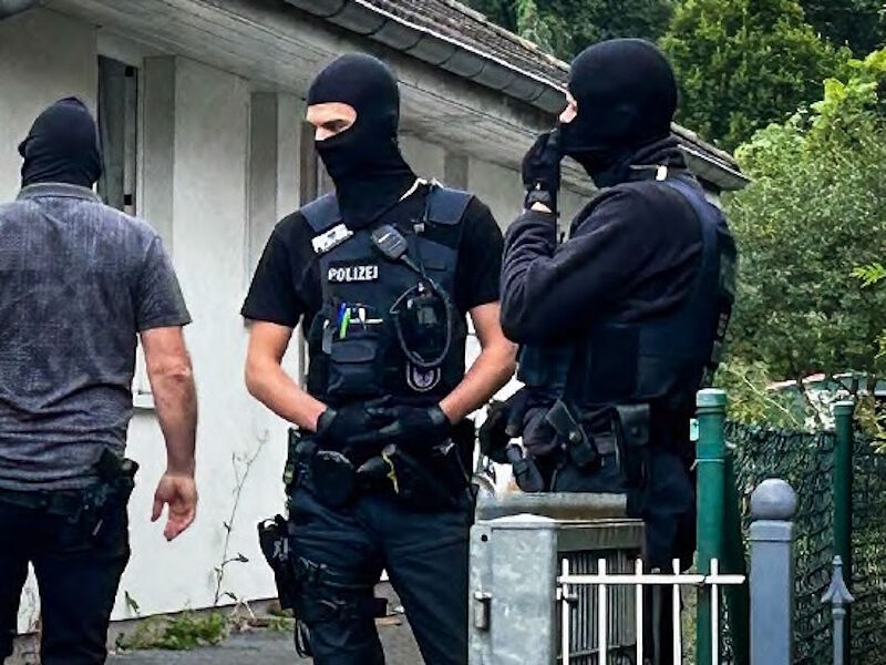Click to enlarge german police raid far right magazine compact