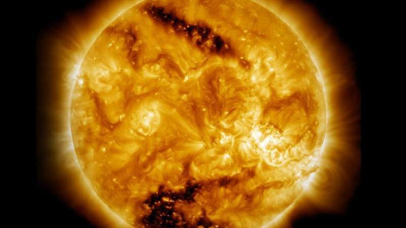 Click to enlarge sun coronal holes