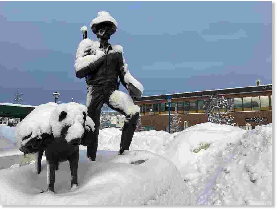 A statue in downtown Whitehorse after a heavy snowfall, Oct. 30, 2024.