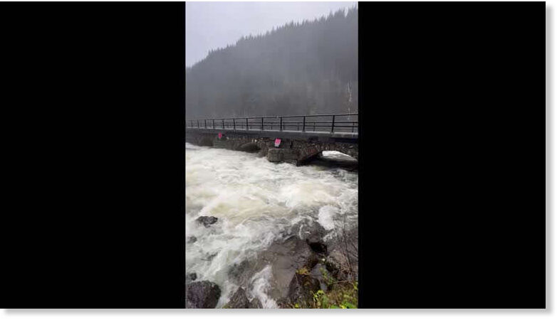 Overflowing river hits bridge in southern Norway