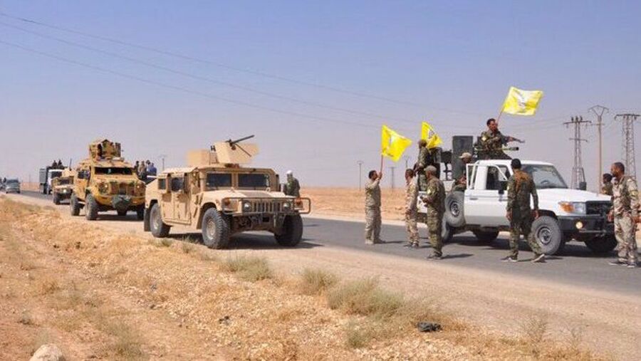 The picture shows US-backed and Kurdish-led militants in Dayr al-Zawr, eastern Syria.