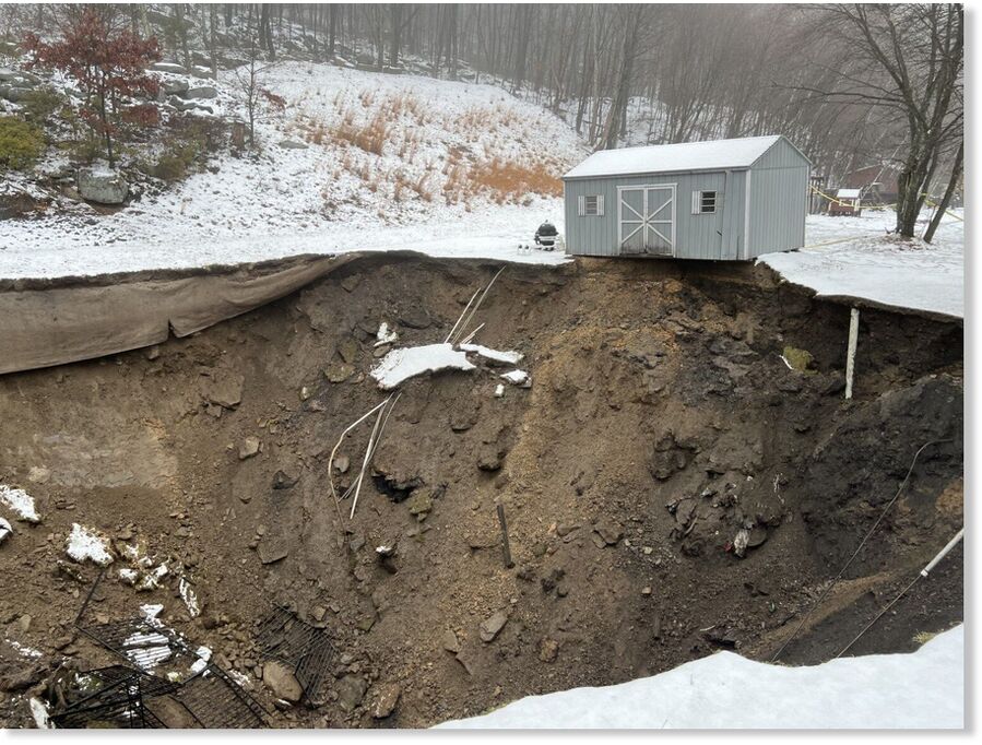 Click to enlarge In-ground pool swallowed by sinkhole in Schuylkill County