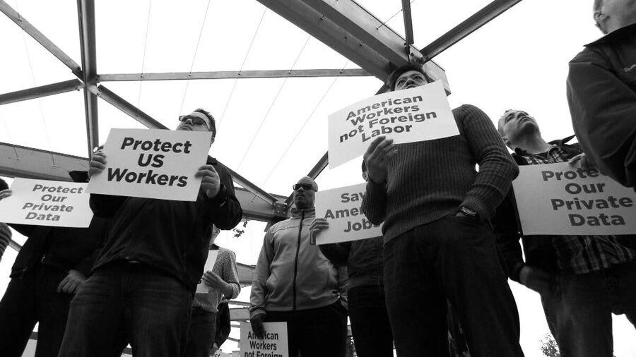 Click to enlarge Foreign workers protest