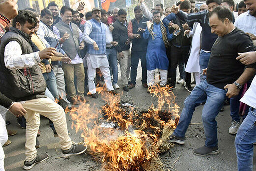 Activists burning an effigy of Congress MP Dhiraj Sahu in protest against corruption and recovering of cash on December 10, 2023 in Patna, India. Photo by Santosh Kumar/Hindustan Times Bihar Politics And Governance