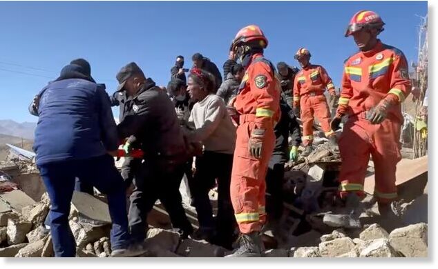 Rescue teams tend to casualties in the aftermath of an earthquake near Shigatse city in Tibet Photograph: Tibet Fire and Rescue