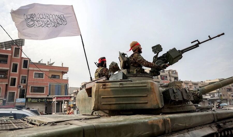 Click to enlarge HTS terrorists