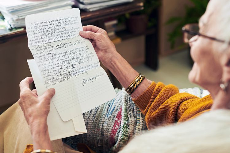 cursive writing elderly reads