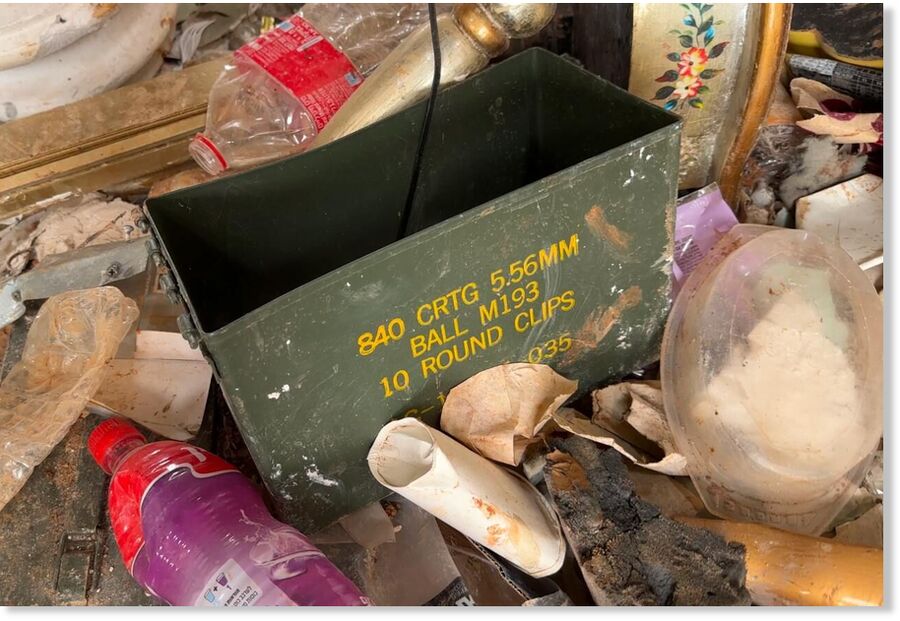 Click to enlarge littered with food tins