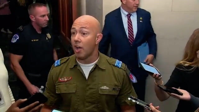 Click to enlarge Brian Mast IDF uniform GOP meeting