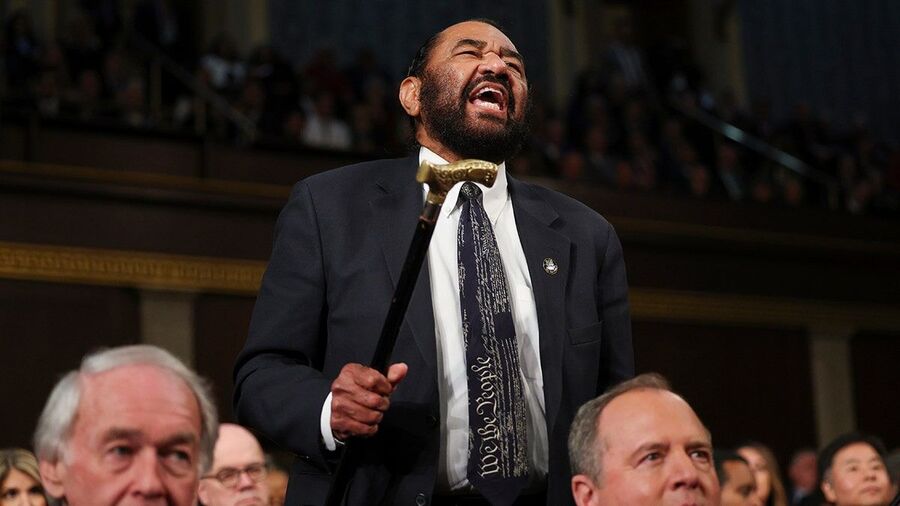 Click to enlarge Rep. Al Green disrupt trump speech congress