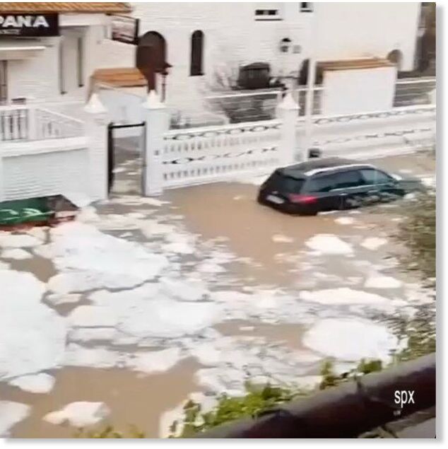 Cars had to smash through sheets of ice floating on the water