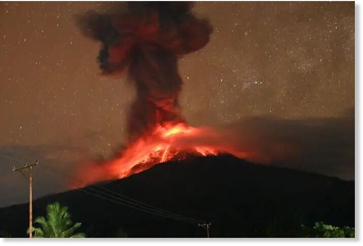 Mount Lewotobi Laki-laki volcano spewing vulcanic materials during an eruption as seen from Pululera village in East Flores Regency, East Nusa Tenggara province on April 27, 2025.