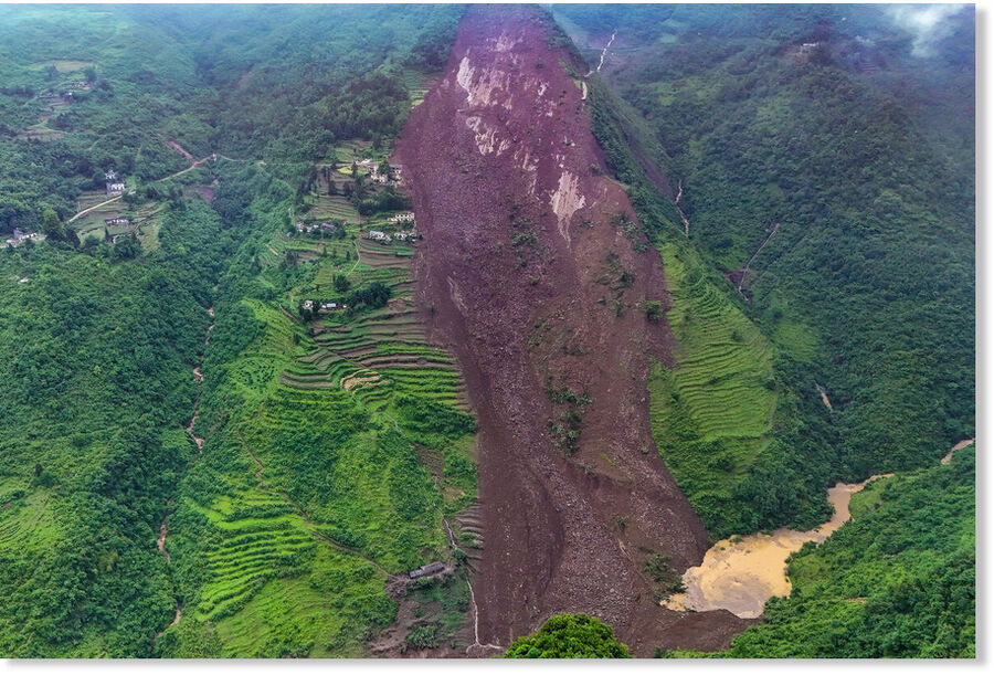 A drone photo taken on May 22, 2025 shows the site where a landslide took place in Qingyang village, Guowa township of Dafang county, Southwest China's Guizhou province.