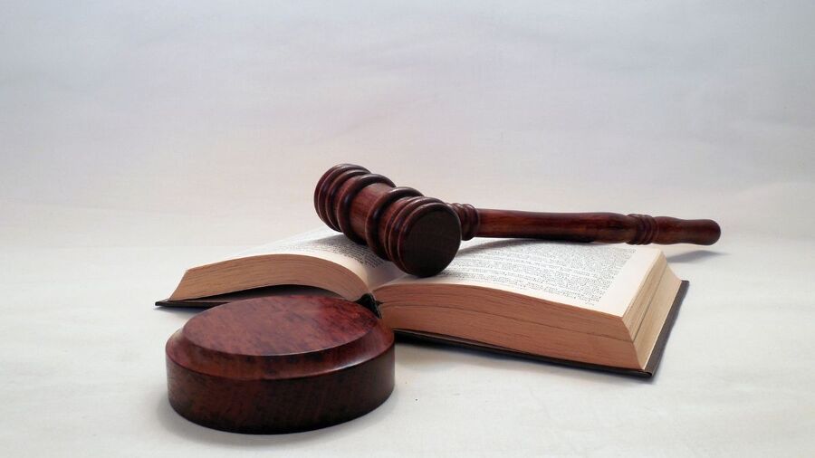 judge gavel law book