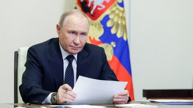 Click to enlarge Vladimir Putin