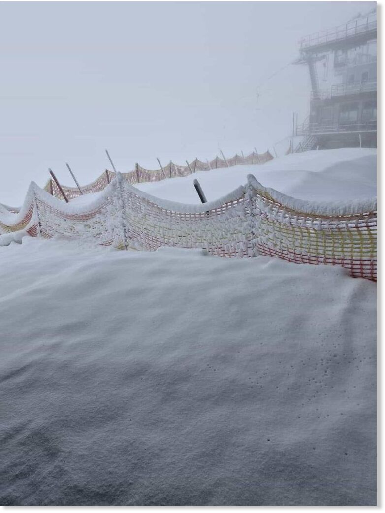 Click to enlarge July snow has blanketed the Alps.
