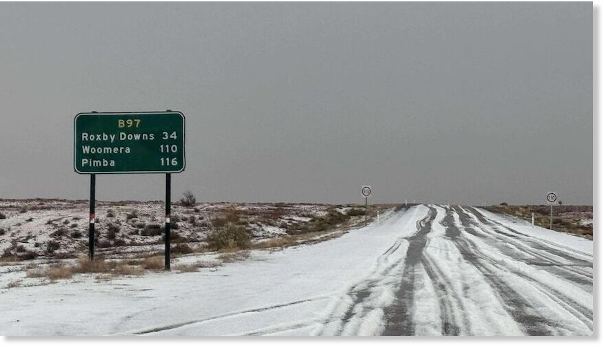 large accumulations of small hail — has covered the roads and red dirt of far north South Australia.