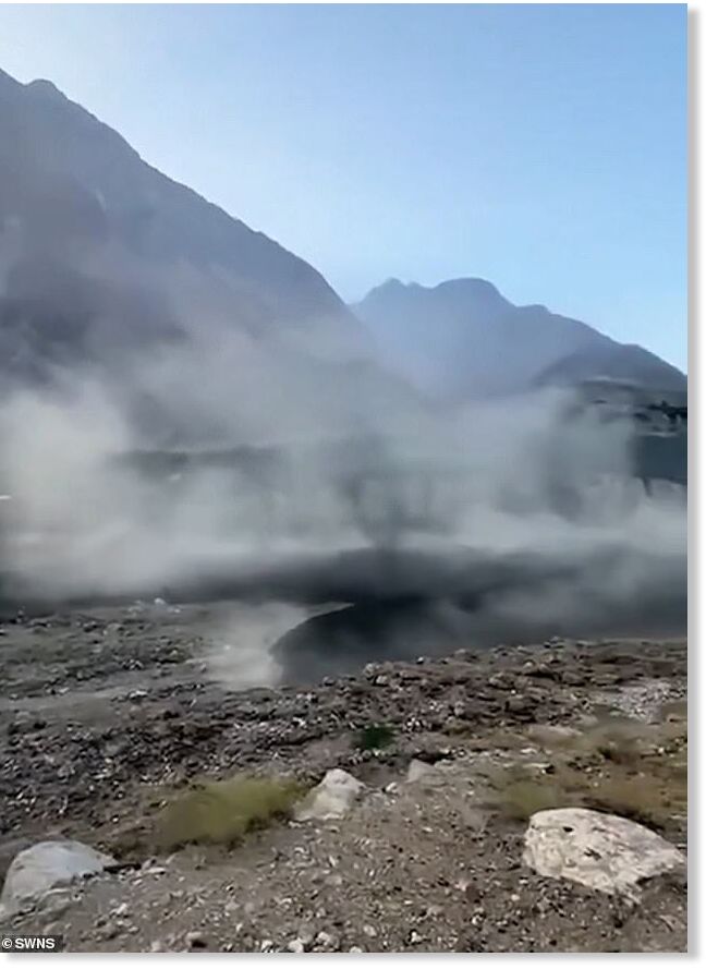 A shocking video shows a huge flood tearing through a remote mountain village in Pakistan following a massive glacial burst - leaving homes submerged by water