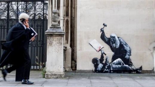 banksy justice mural
