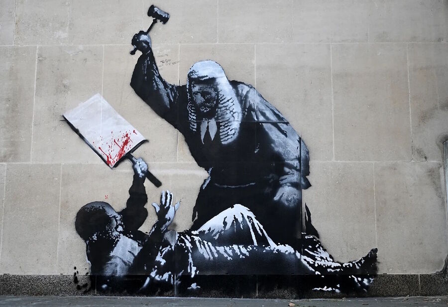 Click to enlarge banksy mural britain protestor judge