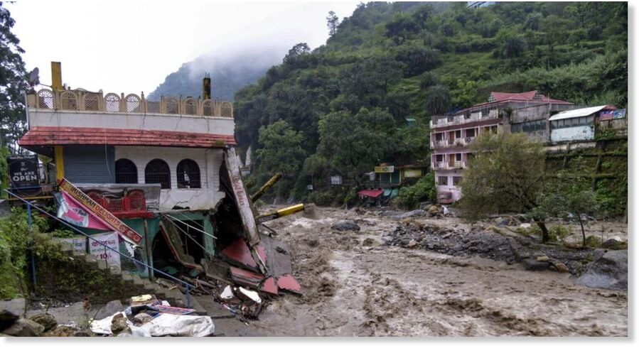 A house near the river lies in ruins after a downpour triggered a cloudburst and landslides, at Sahastradhara, in Dehradun on Tuesday.