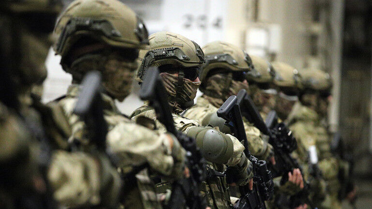 Click to enlarge NATO troops