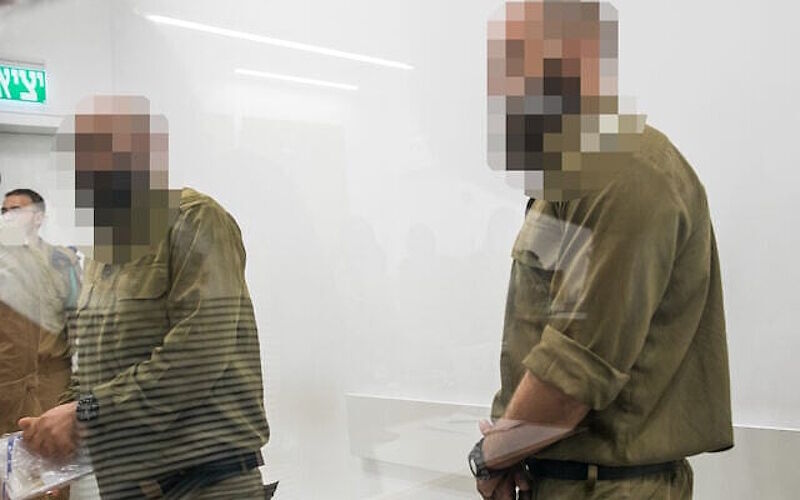 Click to enlarge IDF reserve soldiers abuse detainee Sde Teiman