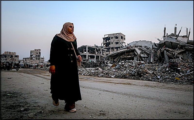 Click to enlarge Palestinian and rubble