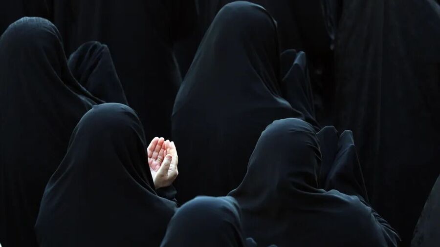 Click to enlarge Women during the rainfall prayer at the Saleh Shrine in northern Tehran