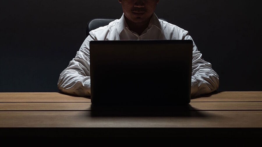 Click to enlarge man computer whistleblower