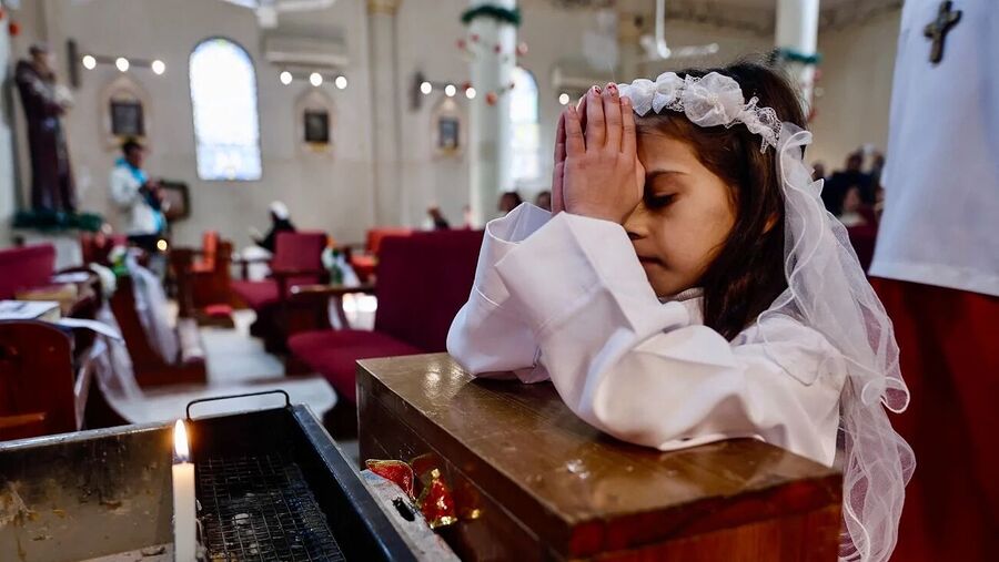 Click to enlarge girl christian church gaza christmas service
