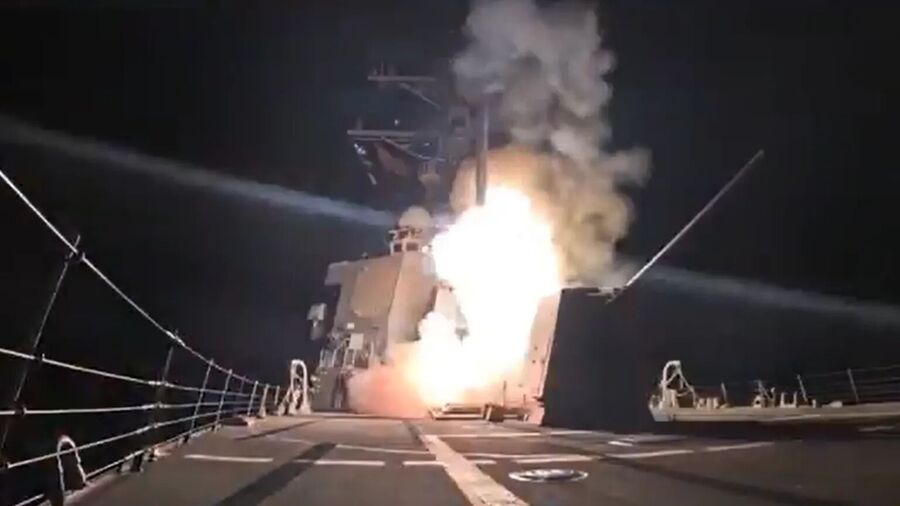 missile being launched from a military vessel.