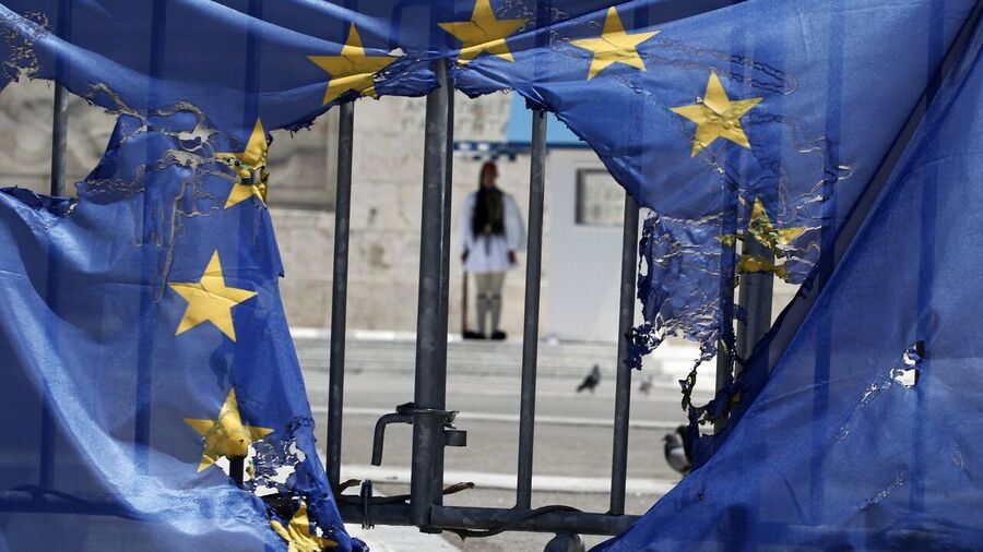 torn european union flag greece