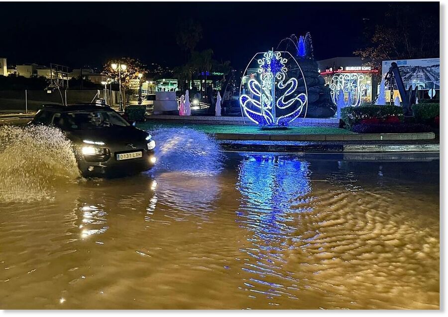 Click to enlarge A driver takes a roundabout on Avenida Picasso in San Pedro.