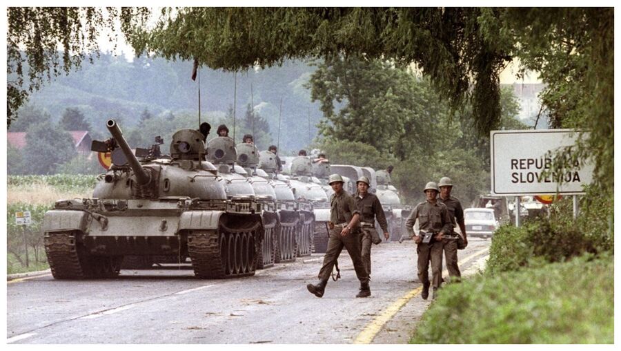 Click to enlarge Yugoslav tank column at Slovenia