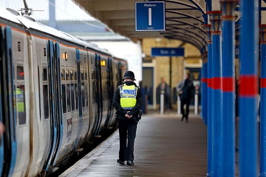 Click to enlarge britain cop train station police