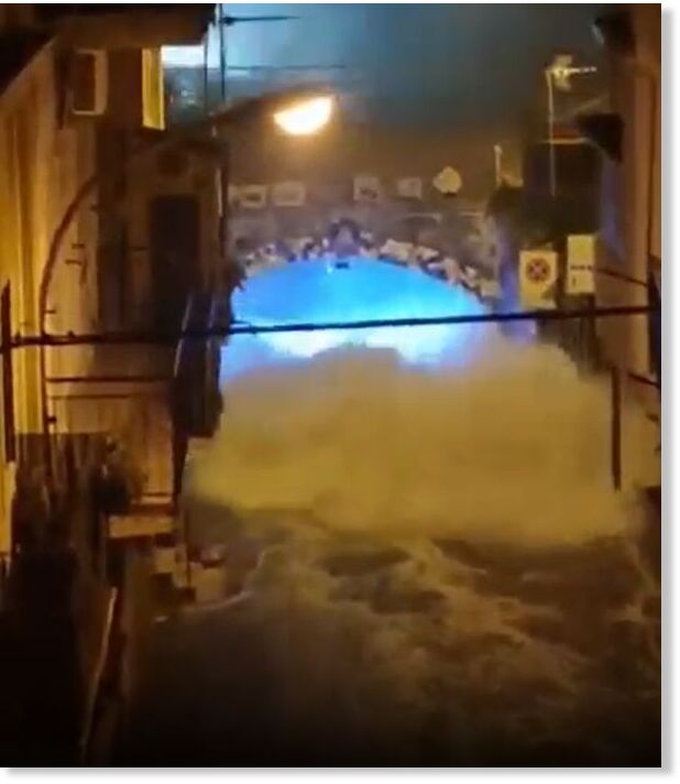 wave then crashes through the street