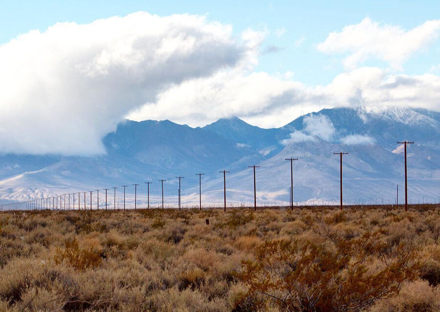 Power poles in the desert.