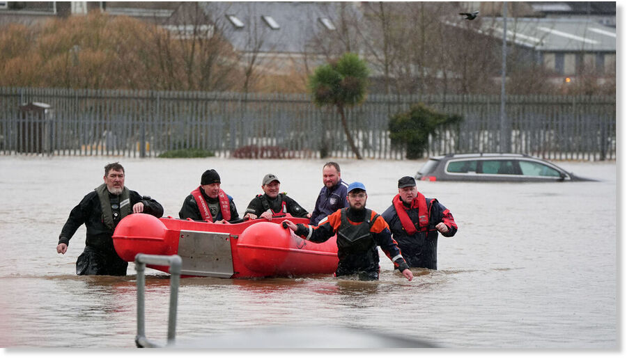 Click to enlarge Members of Slaney Search and Rescue working in floodwater in Enniscorthy, Co. Wexford.