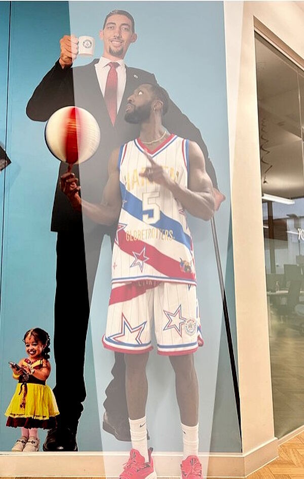 Click to enlarge Bulldog Mack in GWR's London office, standing with our to-scale portrait of Sultan Kösen.