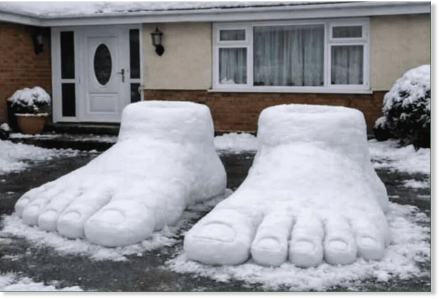 Suffolk police investigate giant snow feet appearing in a residential driveway.